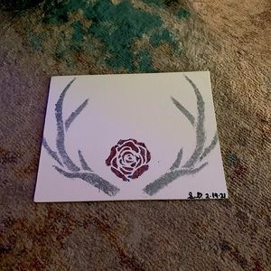 Antlers with a center piece flower painting